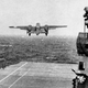 A US Army Air Corps B-25 Mitchell takes off from the deck of USS Hornet, part of the first air attack of WWII against the Japanese homeland (US Navy)